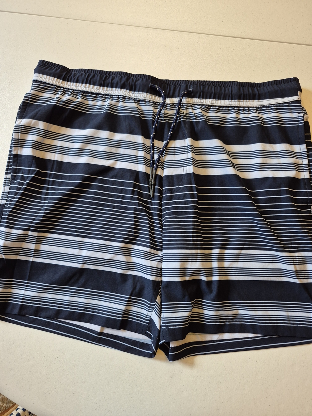 Surfside Supply Navy and White Striped Swim Trunks